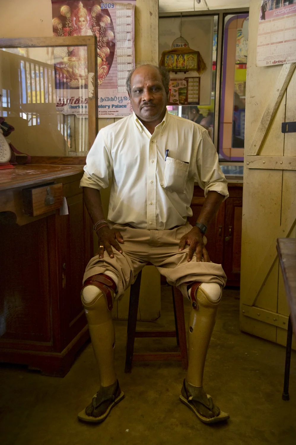 A victim of mine blasts in Jaffna, injured while visiting his sister.