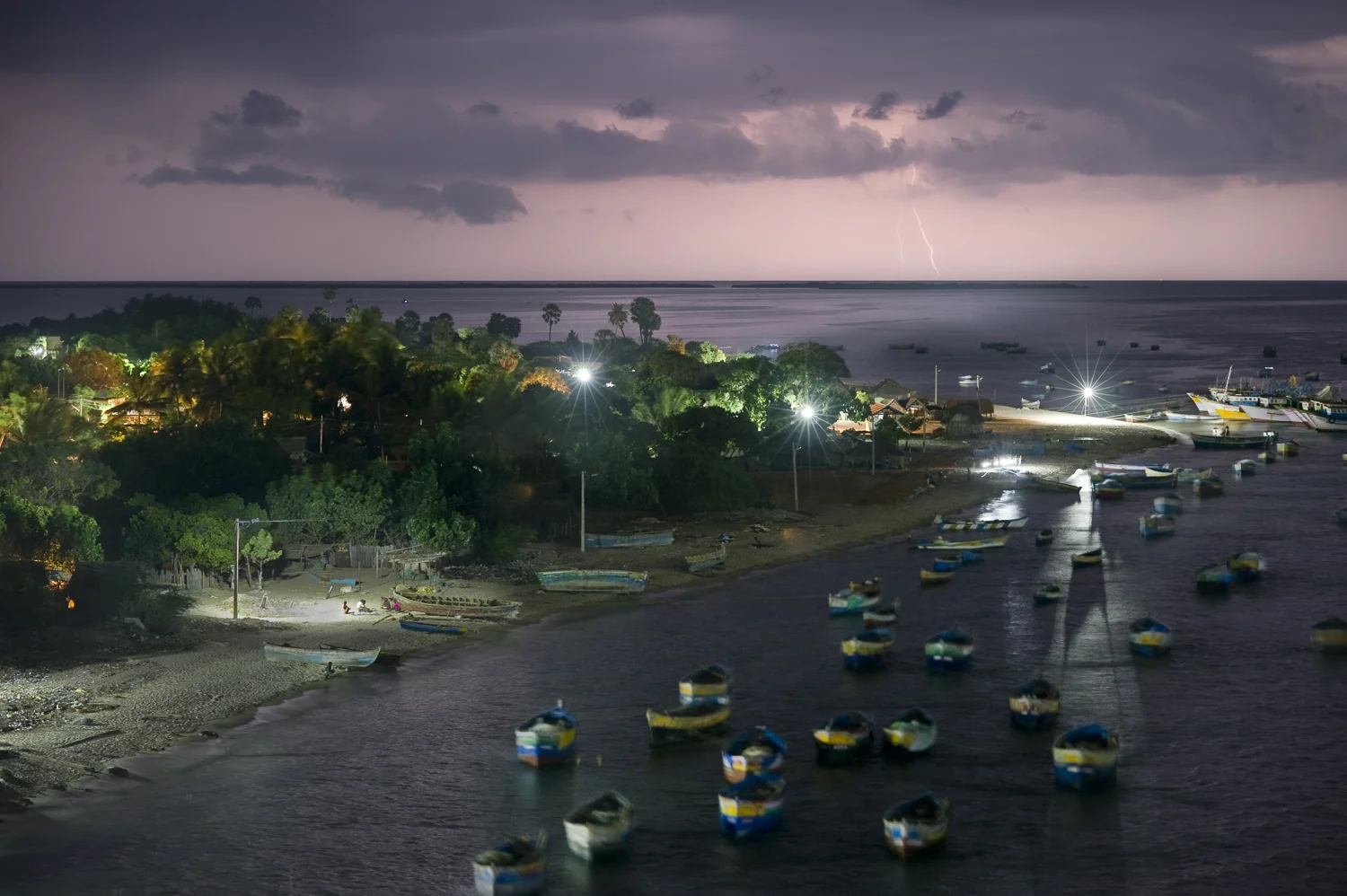 Thunderstorm clouds over a fishing village on Rameswaram island in the Palk strait.