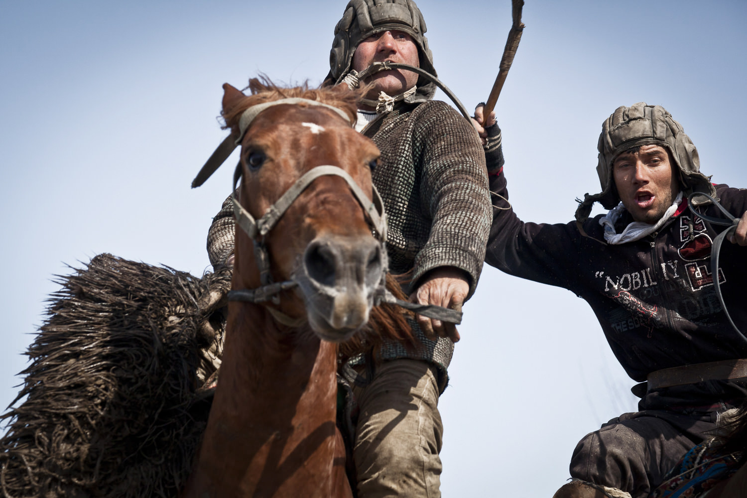  A buzkashi rider escapes from a rival with the prize. &nbsp;Popular throughout much of Central Asia, buzkashi is a form of horse polo in which horseback players wrestle a goat carcass across a playing field. 