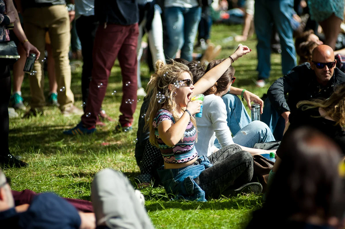 Festival goer making soap bubbles, Field Day, Victoria Park, London, UK, 06/06/2015 © Dosfotos