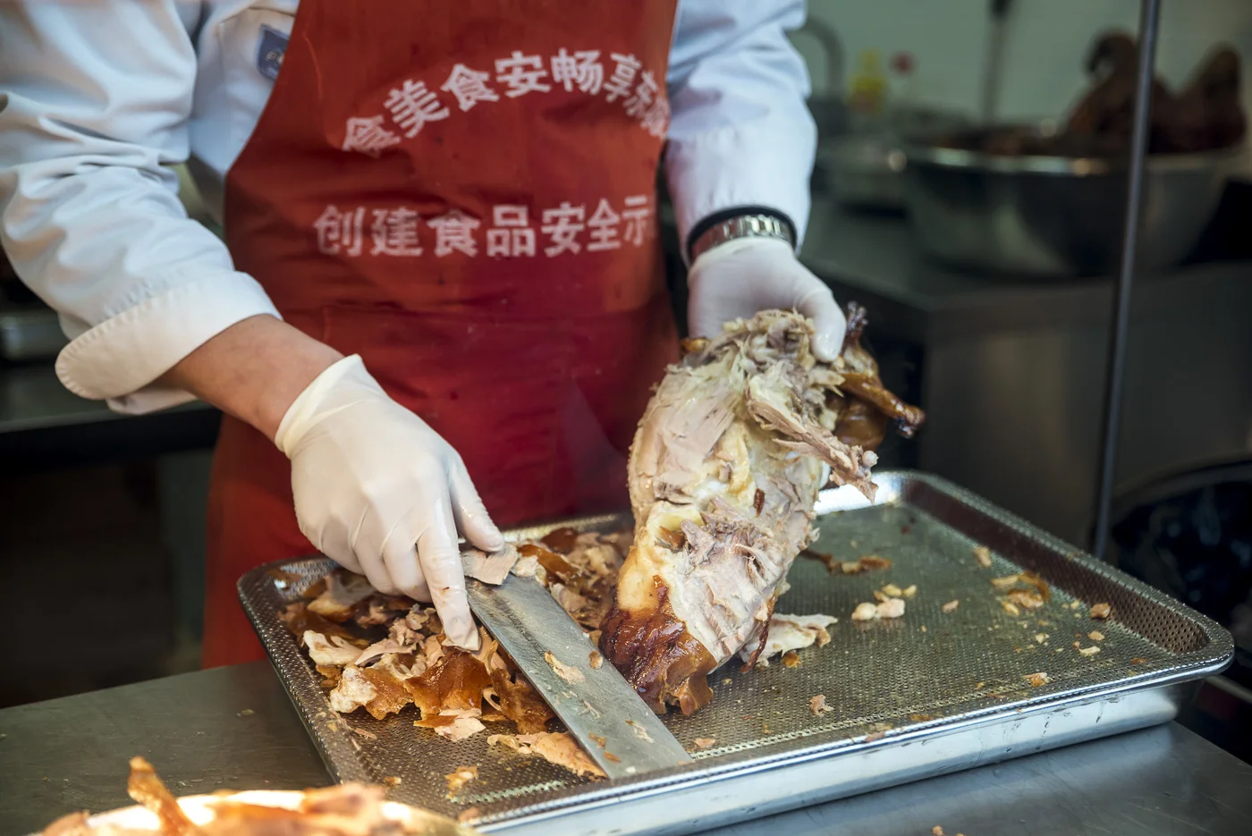 Caramelised duck in Nanluoguxiang Hutong, Dongcheng District, Beijing, China © Dosfotos