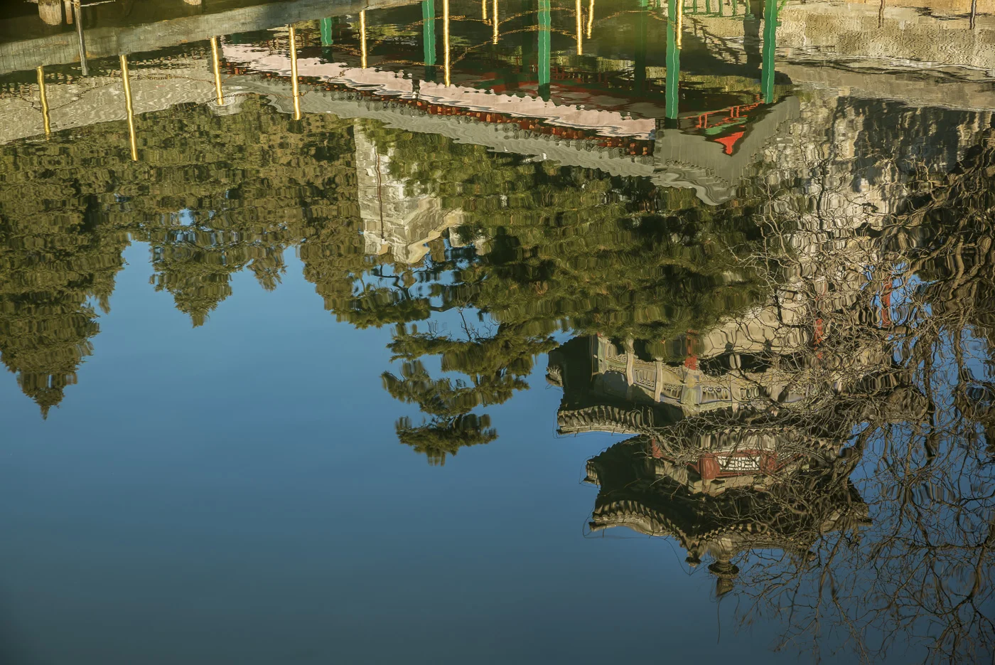 Reflecion of tower an trees in Kunming Lake, The Summer Palace, Beijing, China © Dosfotos