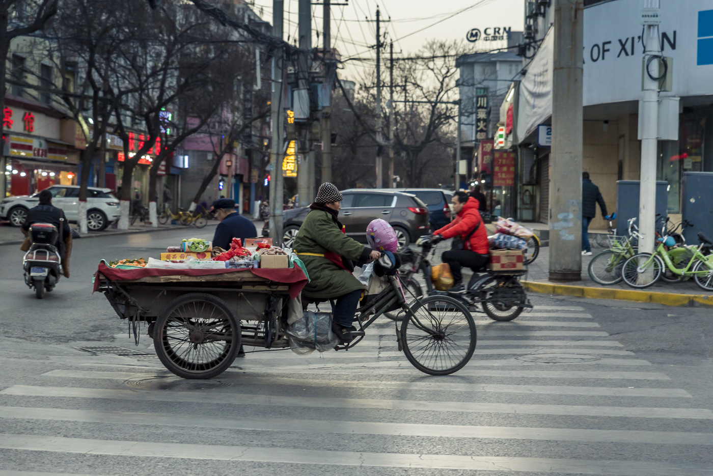 Vehicle carring fruits and vegetables in the streets of Xian, China © Dosfotos