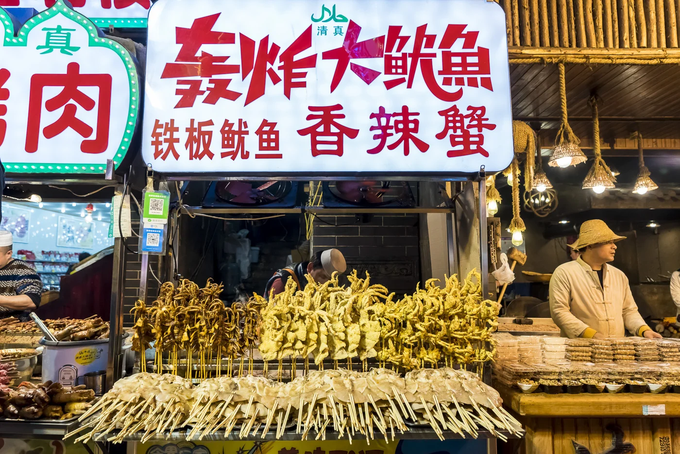 Traditional Chinese food at the famous food market in the Muslim Quarter, Xian, China © Dosfotos