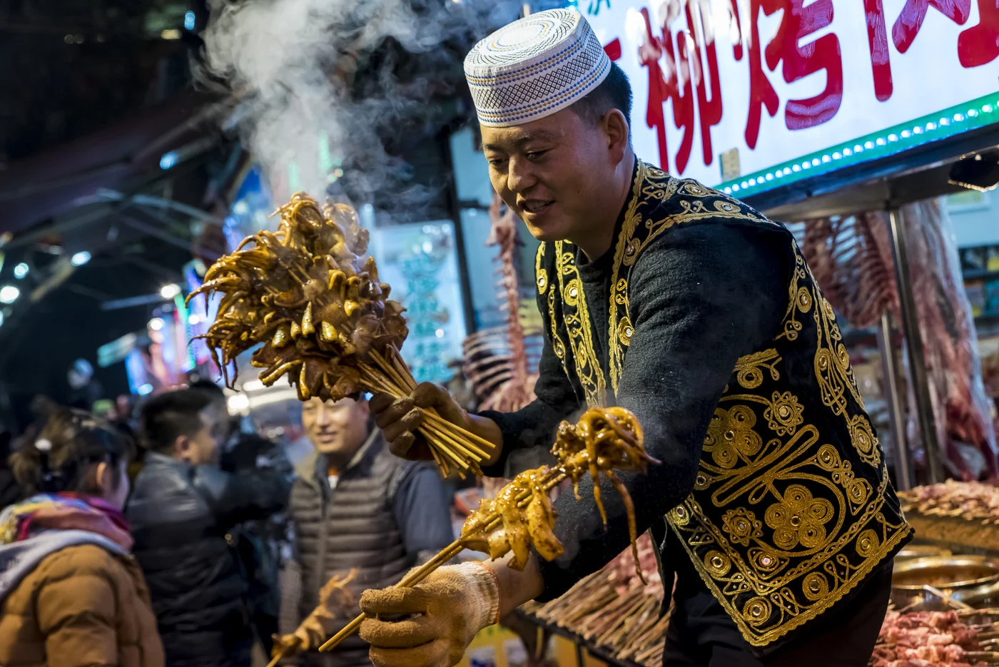 Traditional Chinese food at the famous food market in the Muslim Quarter, Xian, China © Dosfotos
