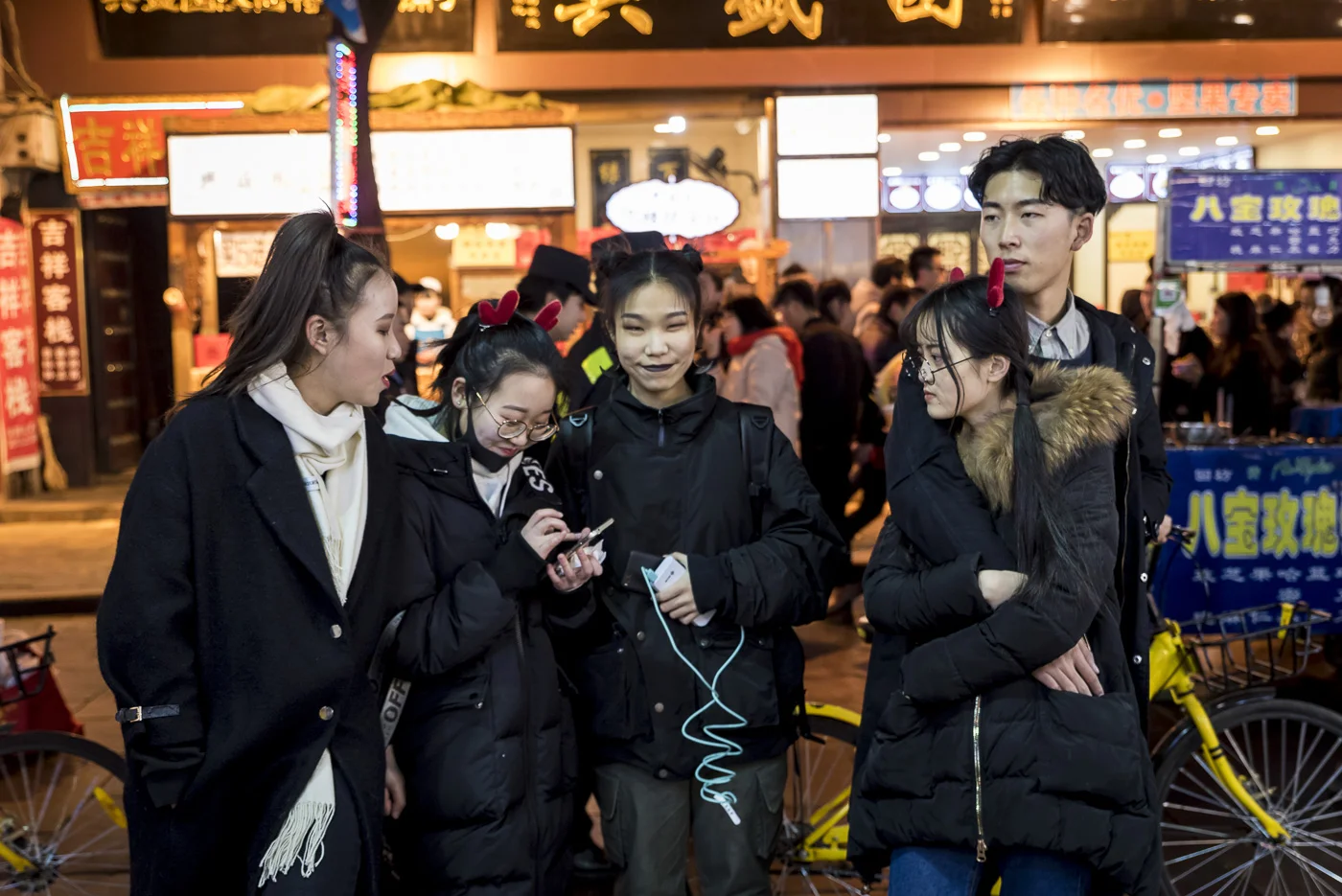 Goth Chinese teenagers at the famous food market in the Muslim Quarter, Xian, China © Dosfotos