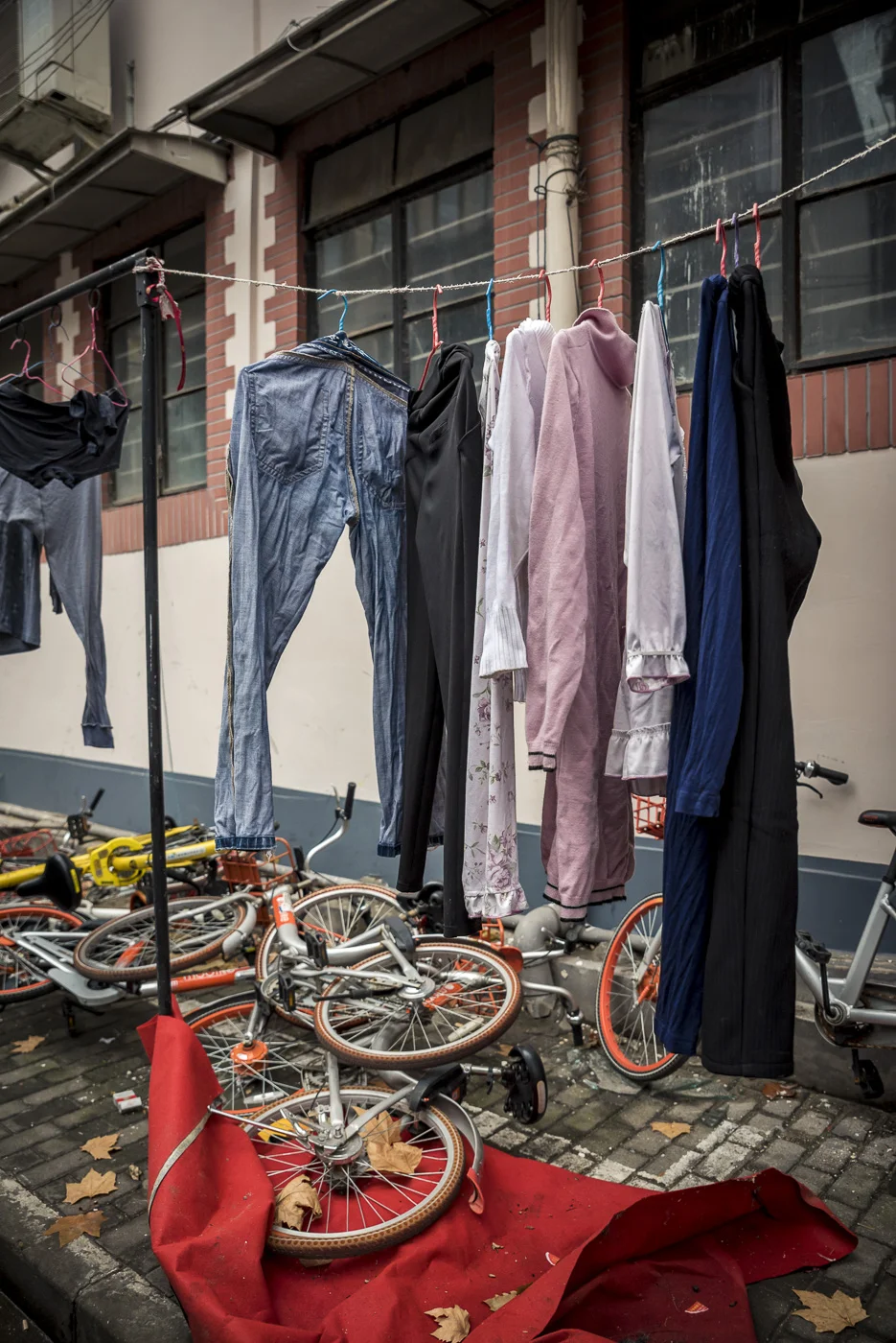 Clothes line and bicyckes around Nanjing Road, Huangpu District, Shanghai, China © Dosfotos