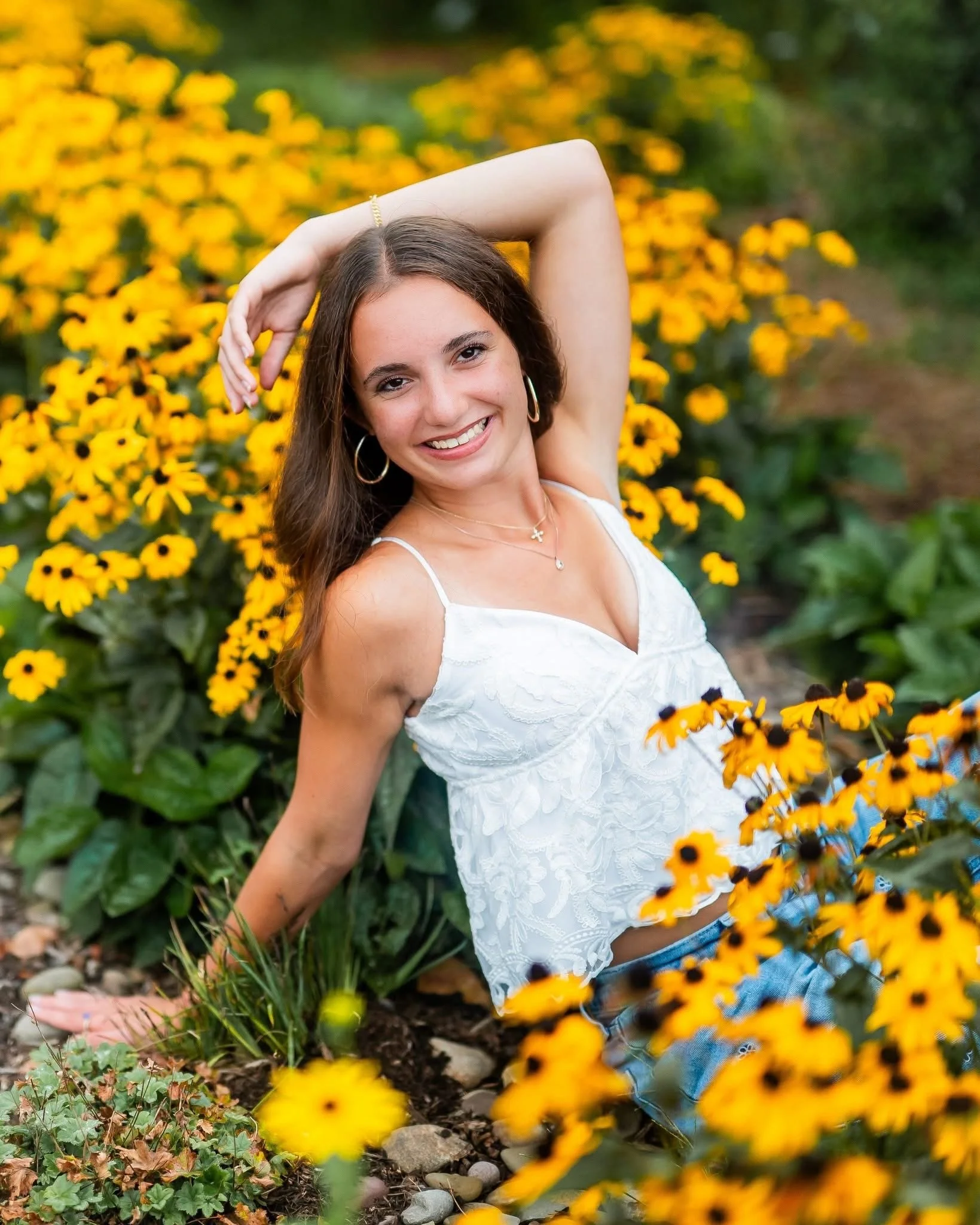 A little summer rain couldn&rsquo;t stop this gorgeous senior session!

We started with a quick rain shower, but thankfully the clouds passed and the sun came back out so Emilia could soak up all the beauty of the late-summer blooms. 

I&rsquo;ve had