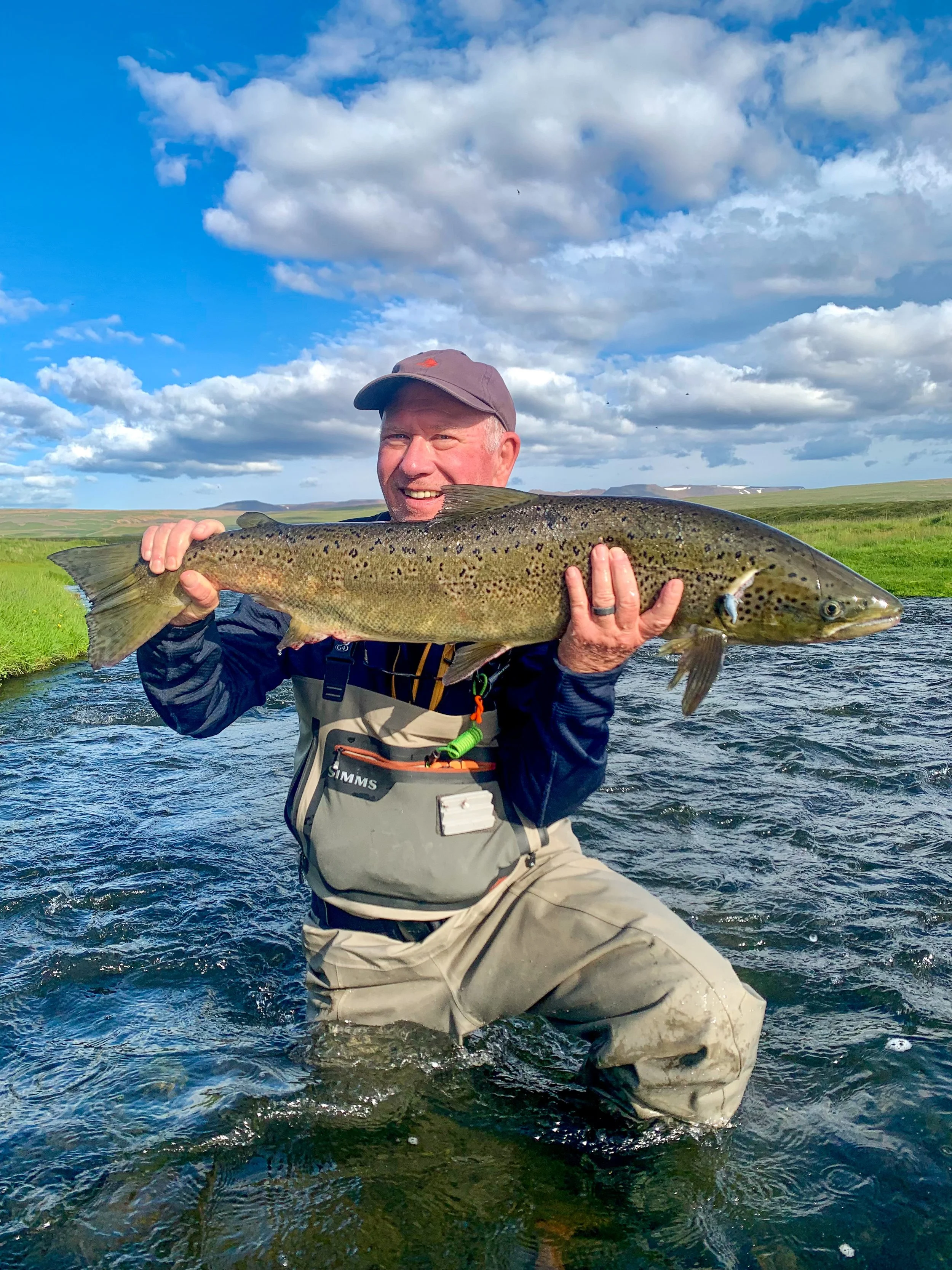With a 95 cm Atlantic salmon, Tom is all smiles!