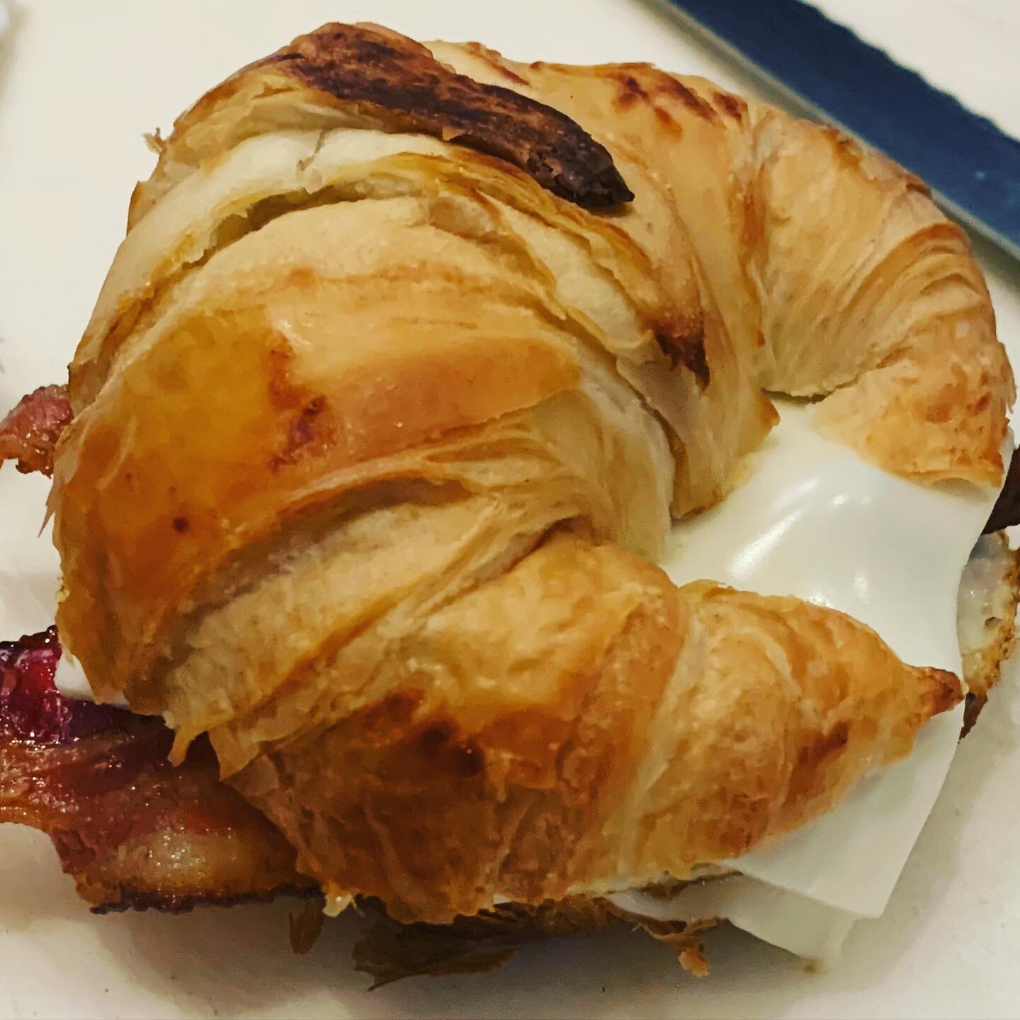 Question..what goes perfectly with a cup of @thirdcoastcoffee #ethopianyirgacheffe? A fresh baked croissant with a fried egg, bacon and monterey jack