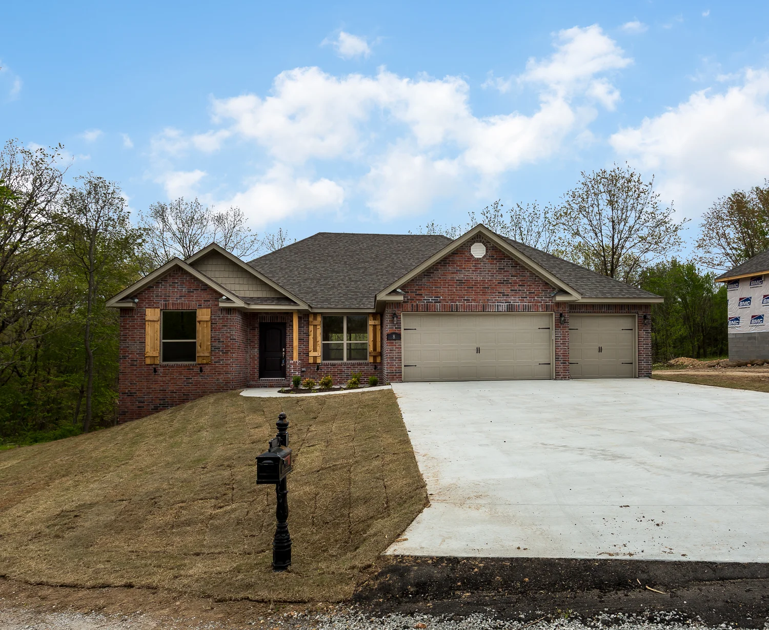 Front elevation shot real estate photo of home in Bella Vista.