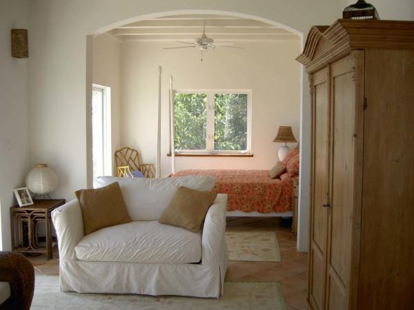 MASTER GUEST SUITEprivately situated on lower level, western wing of home //queen bed // 'sleep number' adjustable matress // adjoining sitting area for relaxing or watching TV // sliding glass door and windows for east, south and western sunset exp…