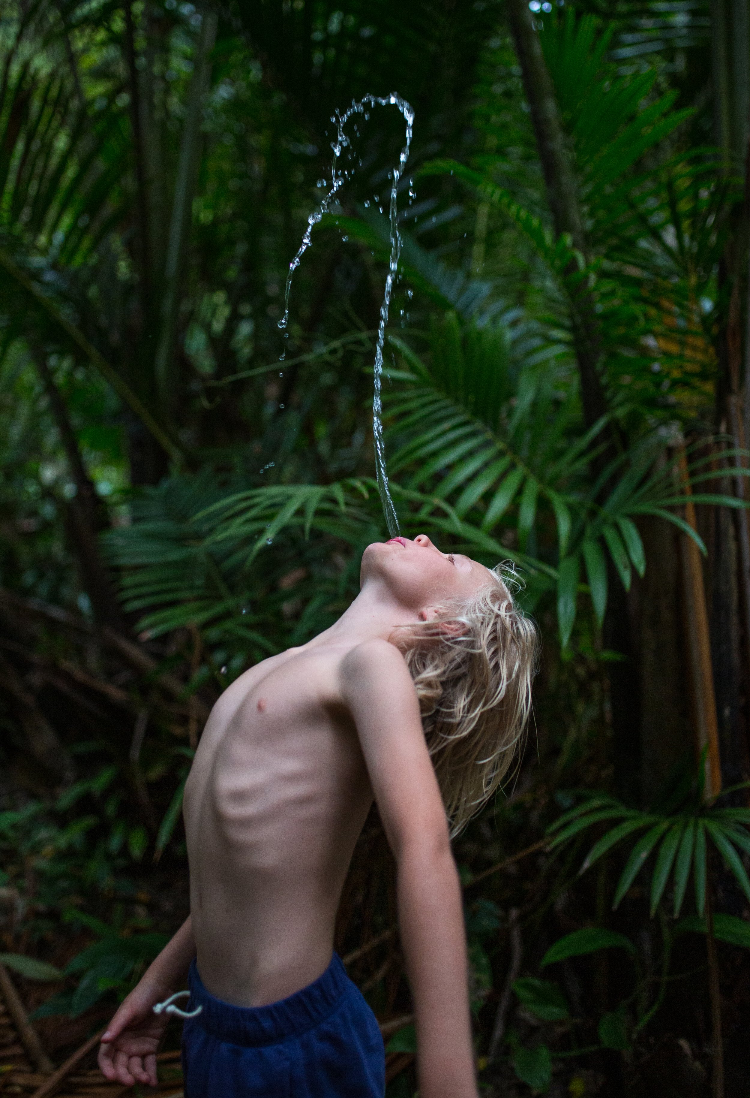   Papua New Guinea, 2016 -  Spitting water in a jungle on the Southern Coast.  