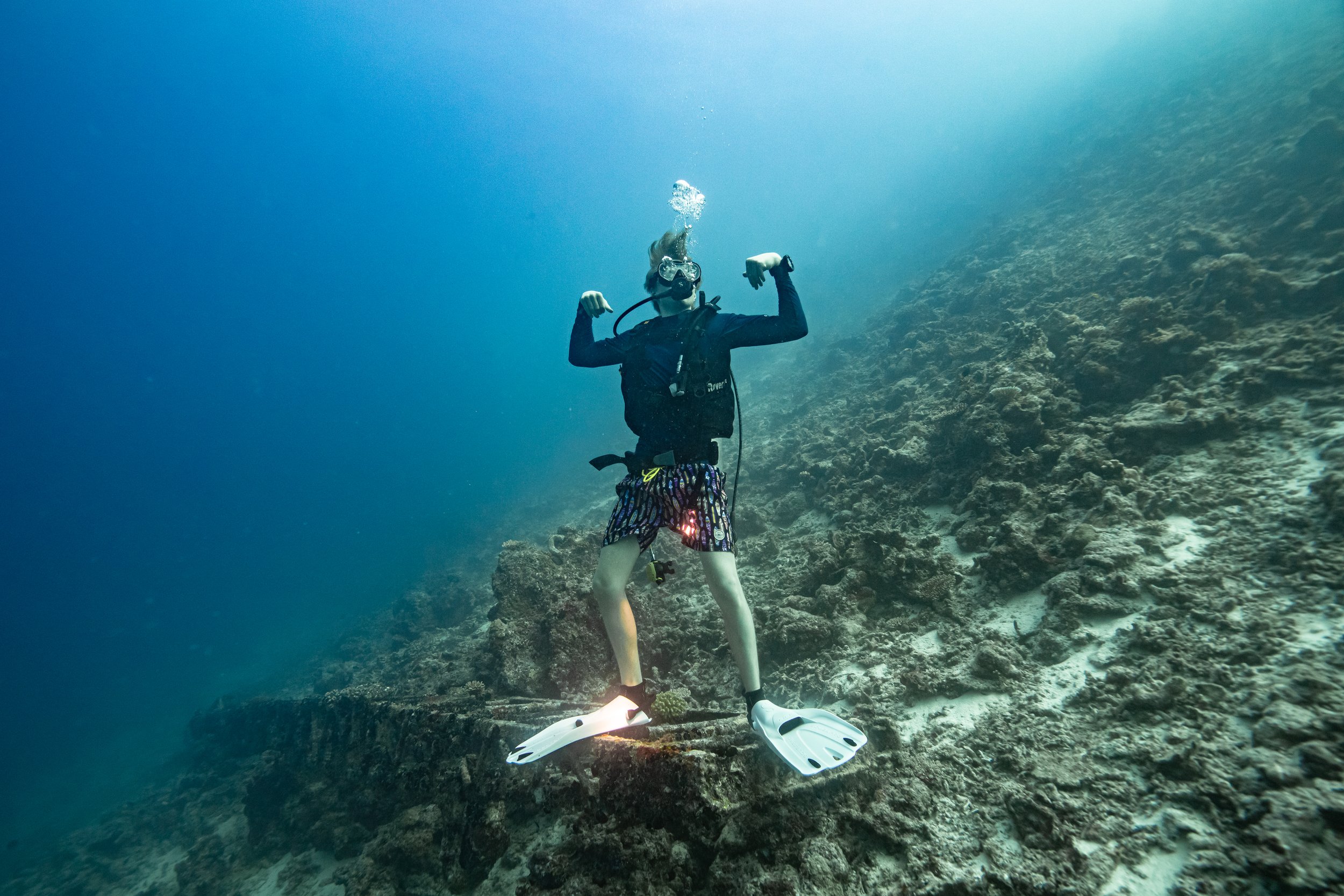   Maldives, 2022  - Goofing around while scuba diving at a ship wreck site. 