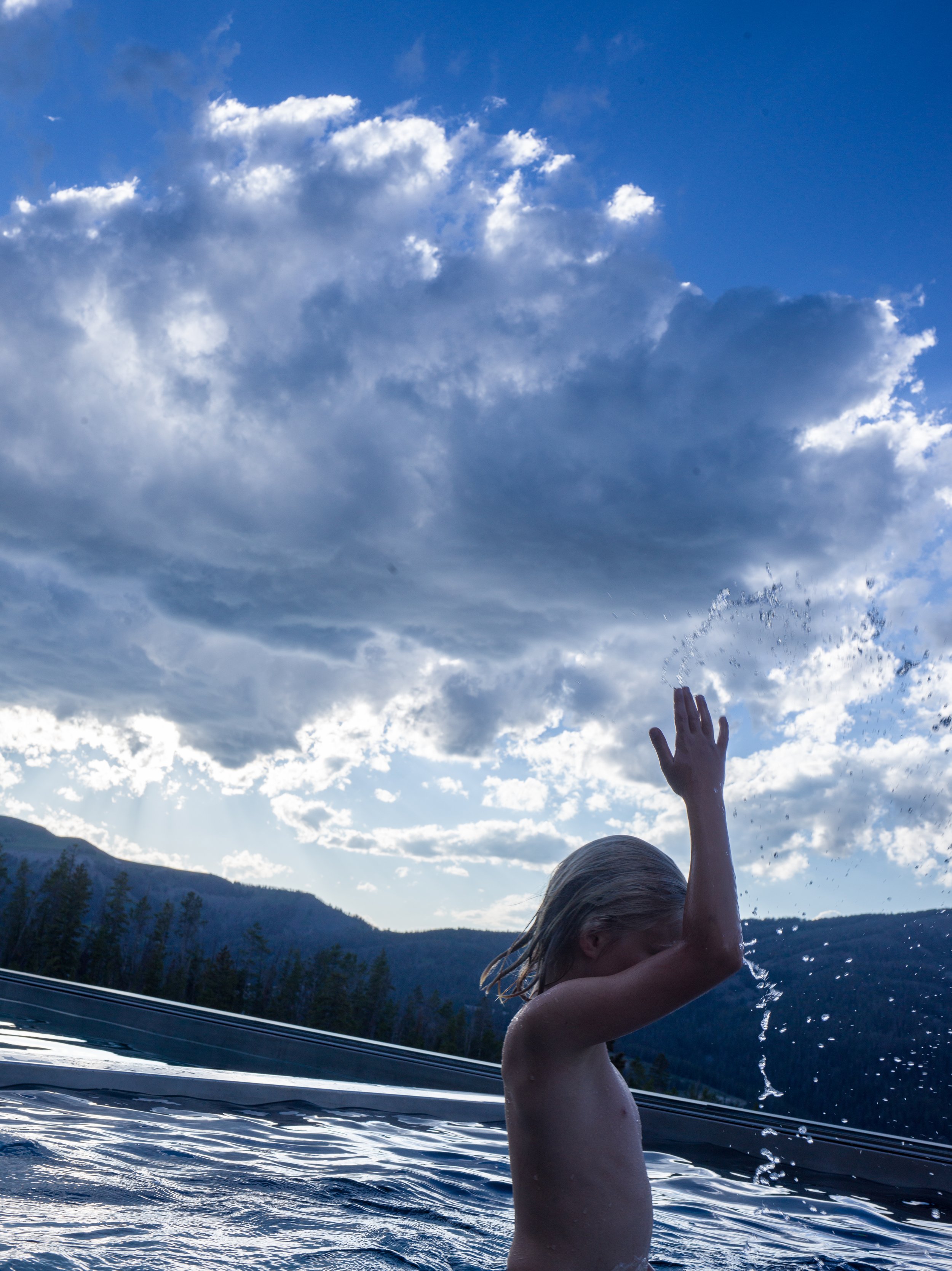   Montana, 2017  -  Playing in a pool in the Spanish Peaks. 