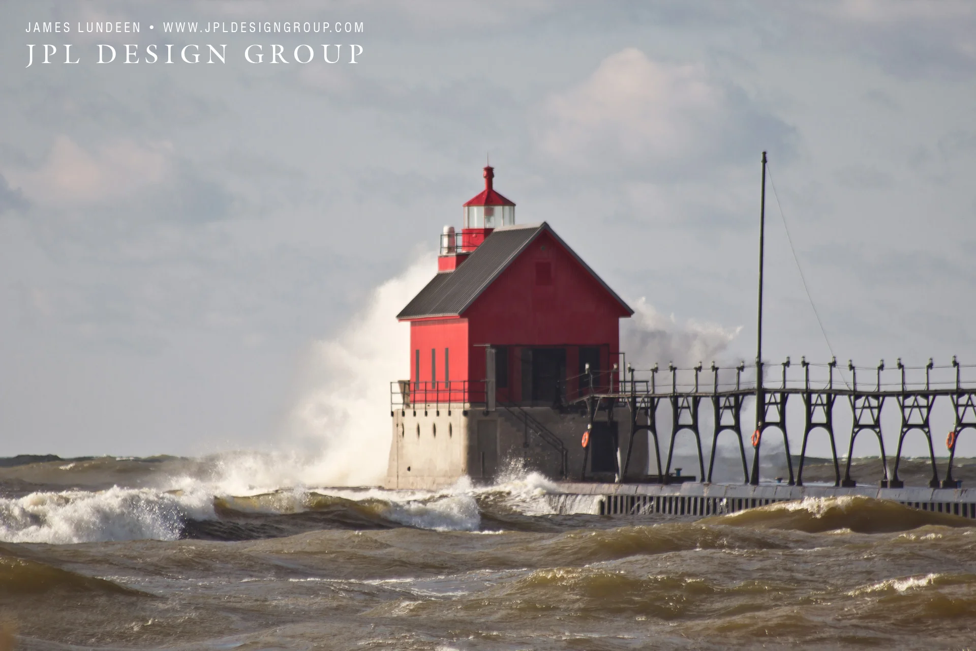 Waves Crashing Against The Grand Haven Lighthouse