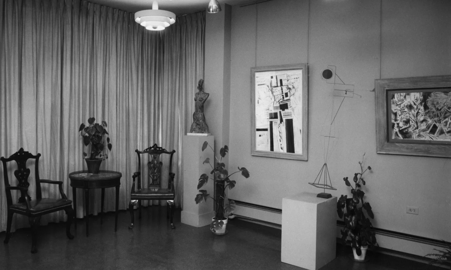Photograph of Kraushaar Galleries, 1055 Madison Avenue, c. 1968 - two sculptures and two paintings on display