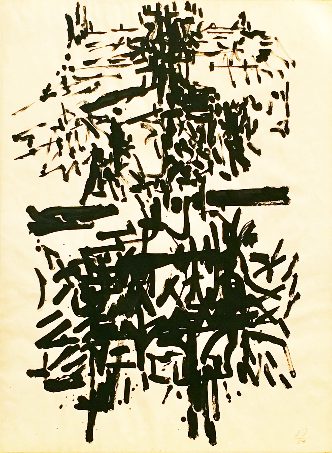 Abstract drawing of black brushstrokes on paper