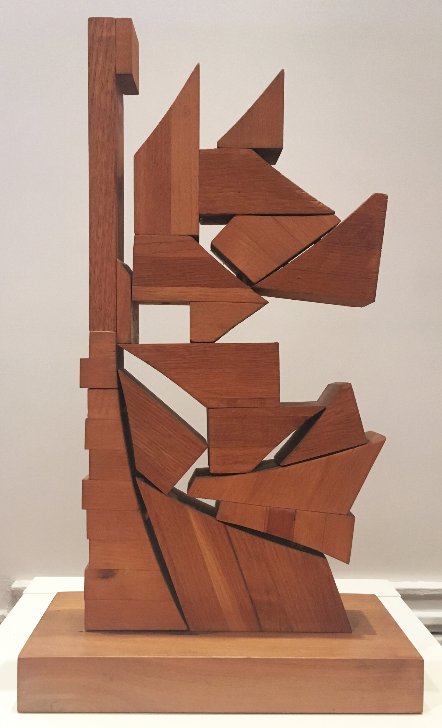 Abstract wood sculpture with geometric forms by Dorothy Dehner