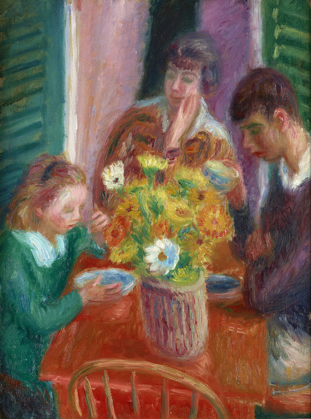 Image of three figures seated at a table on a porch. Yellow bouquet of flowers in center