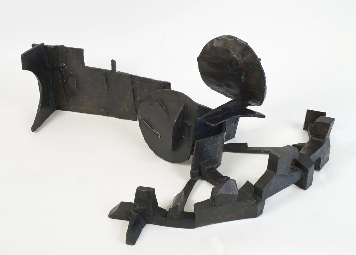 Abstract sculpture of circles and jagged shapes.