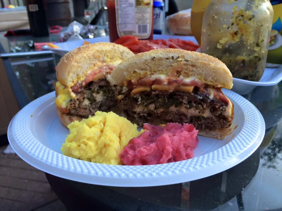 Omar's famous jalepeno and feta stuffed 1/2 pound burgers. So good!