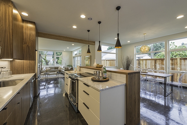 TC Legend Homes built this 2,463-ft2 home in Seattle, Washington, to the performance criteria of the DOE Zero Energy Ready Home (ZERH) program. The two-story home has SIP walls and triple-pane windows for draft-free construction and high insulation values.