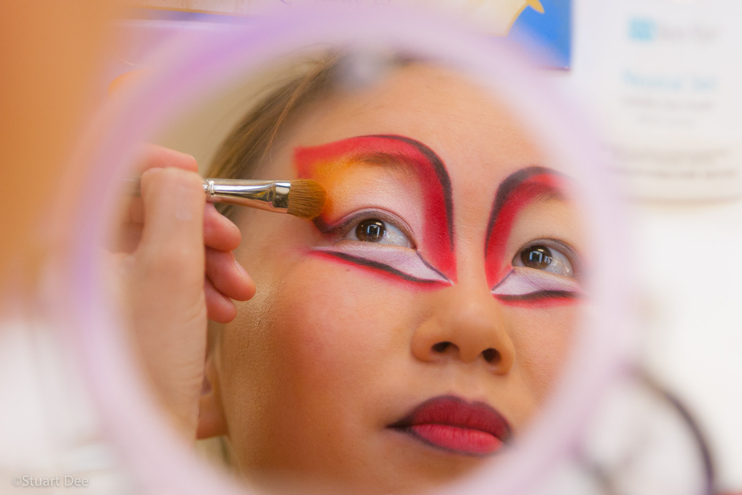 Cirque du Soleil show performer, putting on makeup, Las Vegas, Nevada, USA