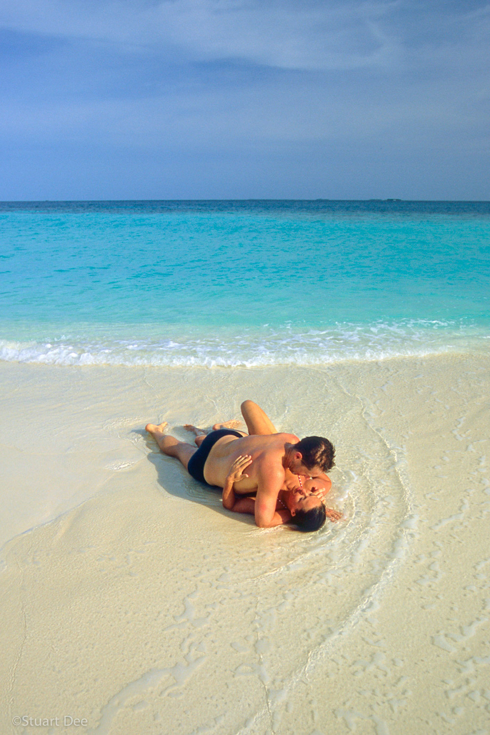 Couple at beach R, Maldives