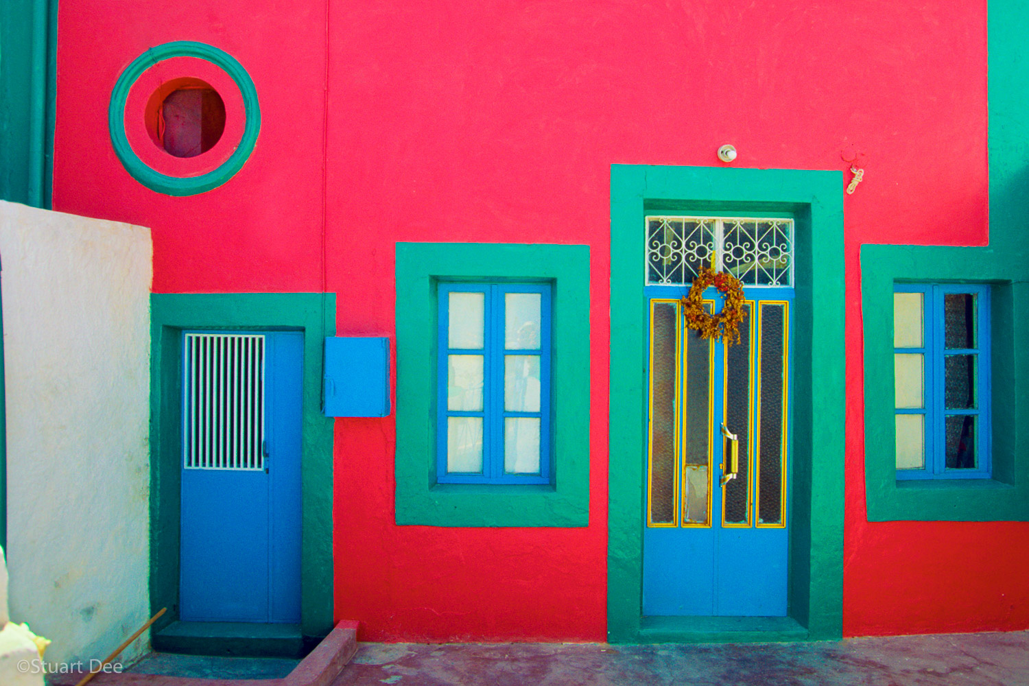  Colorful facade, Manolas, Santorini, Greece 