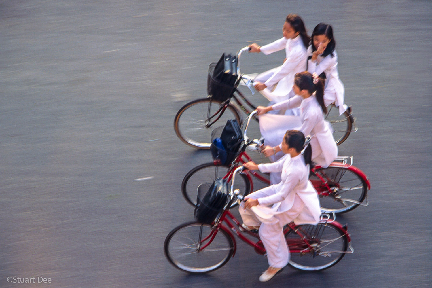 Girls on bikes, Ho Chi Minh City, Vietnam