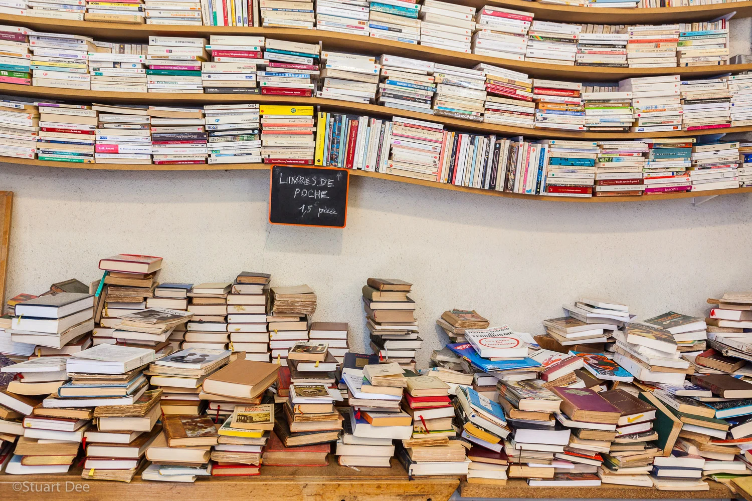 Books for sale, Les Puces de Saint-Ouen Flea Market, Porte de Clignancourt, Paris, France.
This is the largest and most well-known flea market in Paris, also known as Les Puces.