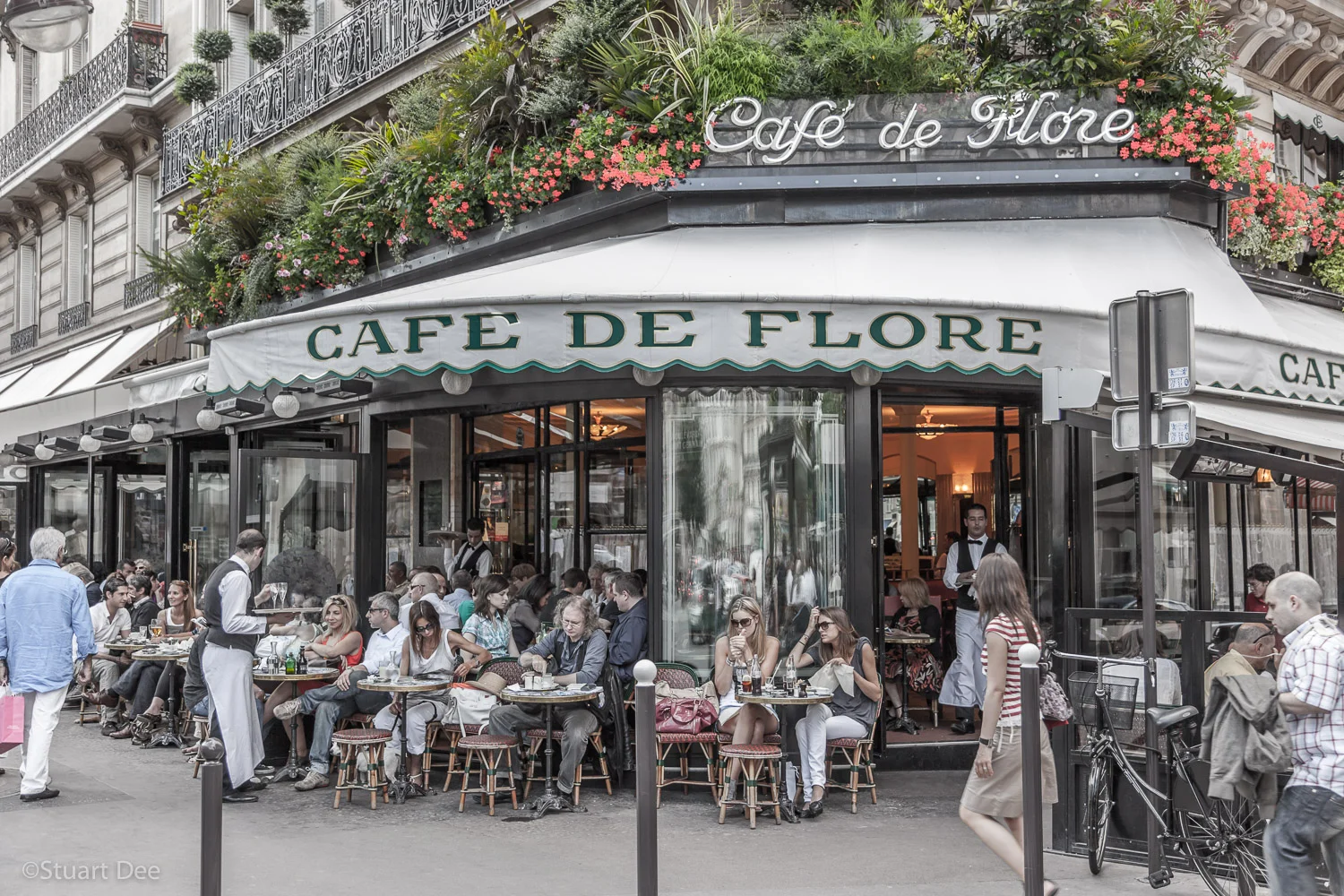 Cafe de Flore, Saint-Germain-des-Pres, Left Bank, Paris, France.
This cafe, like the Les Deux Magots, was historically an important meeting place for artists, writers and other intellectuals, and is now a popular tourist attraction.