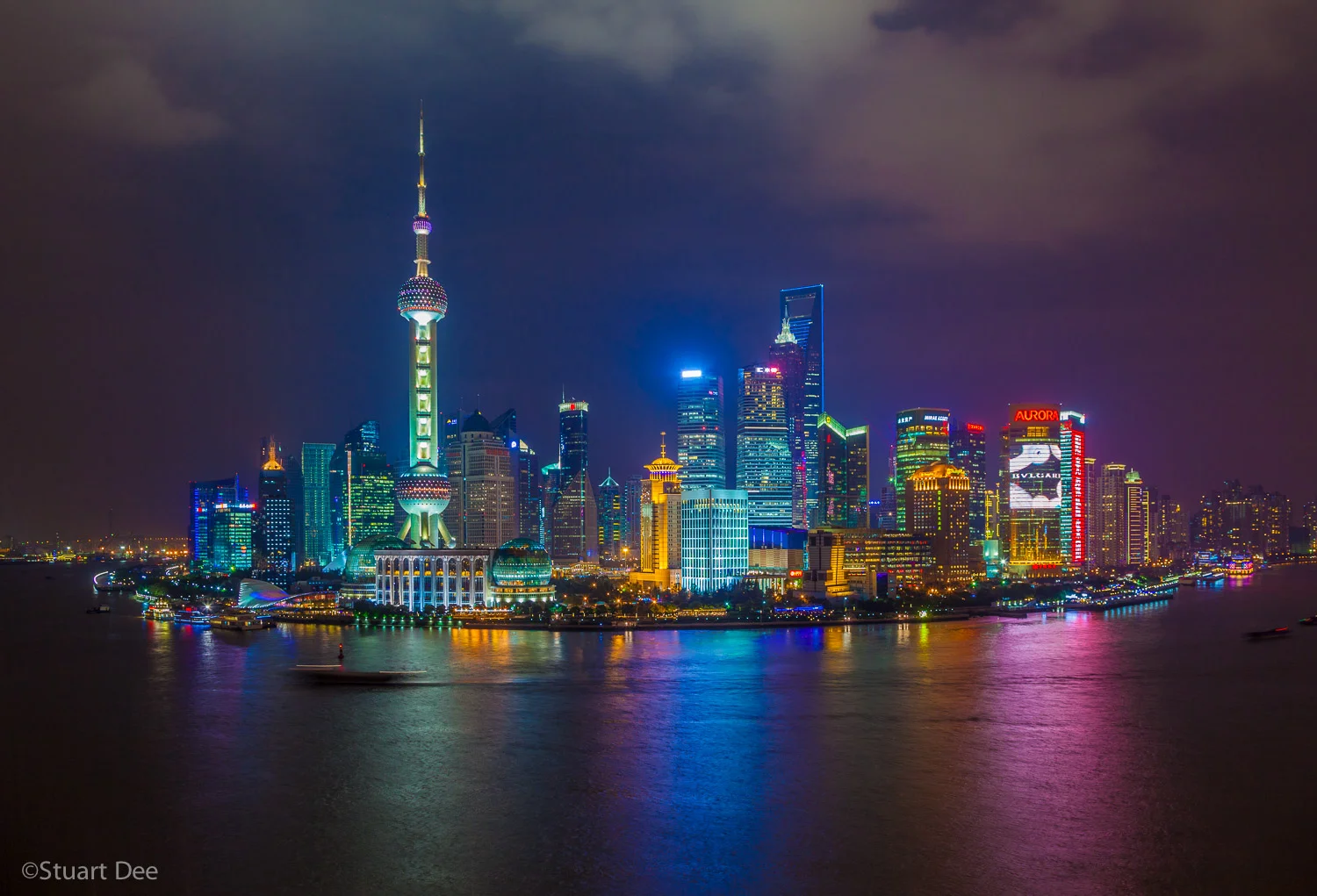 Pudong skyline and Huangpu River at night, Shanghai, China.