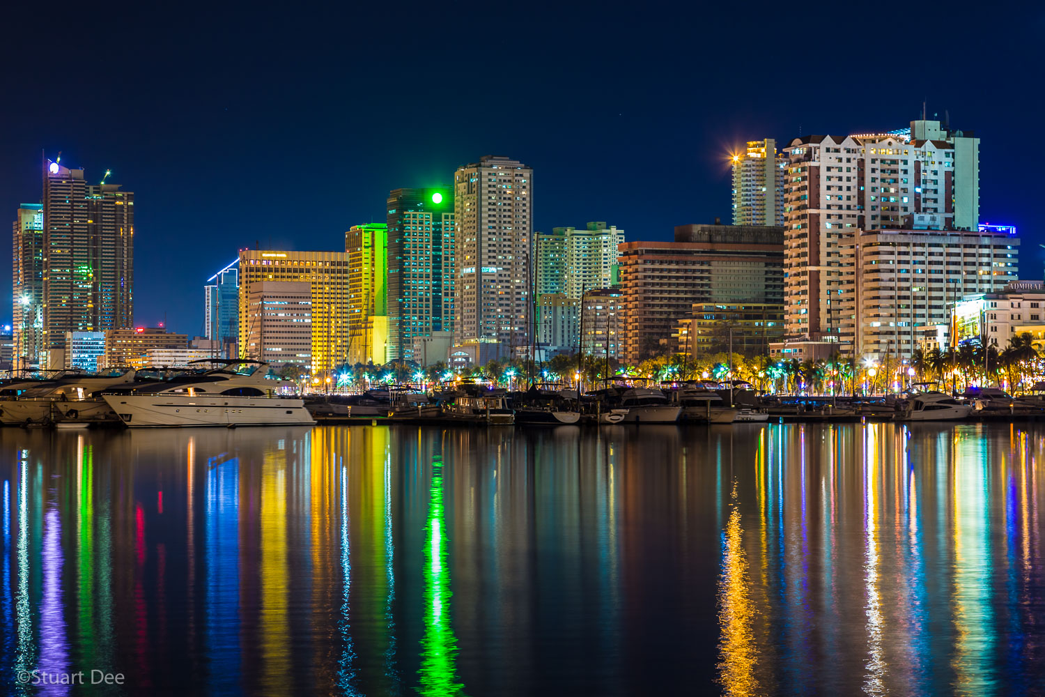  City skyline at night by Manila Bay, Metro Manila, Philippines 