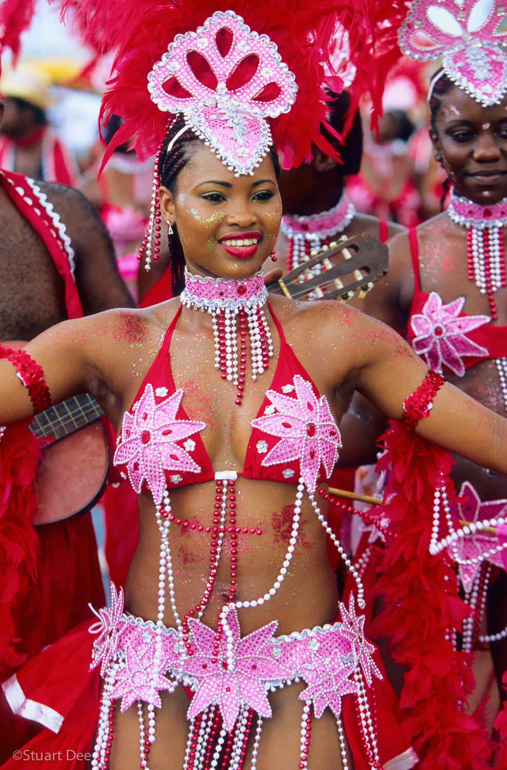  Close up of Carnival participant, Grand Kadooment, Crop Over Festival, Barbados. The Crop Over Festival is a Barbadian festival celebrating the end of the local sugar cane crop harvest, hence it's name. It is the major Festival of Barbados. During G