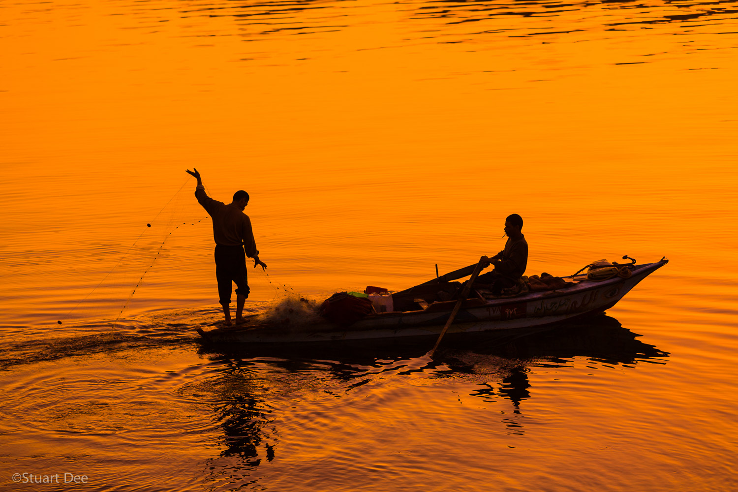  Fishermen on the Nile at sunset, Cairo, Egypt 