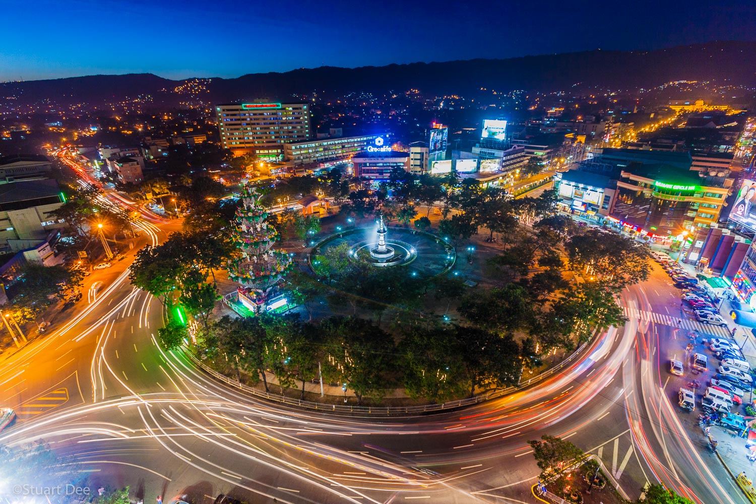  Aerial view of Fuente Osmena Circle and dusk/night, , Cebu City, Cebu, Philippines. Osmena circle is the center of Cebu City and is the landmark symbol of the city. Cebu City is the Capital of Cebu, and is the second largest city in the country afte