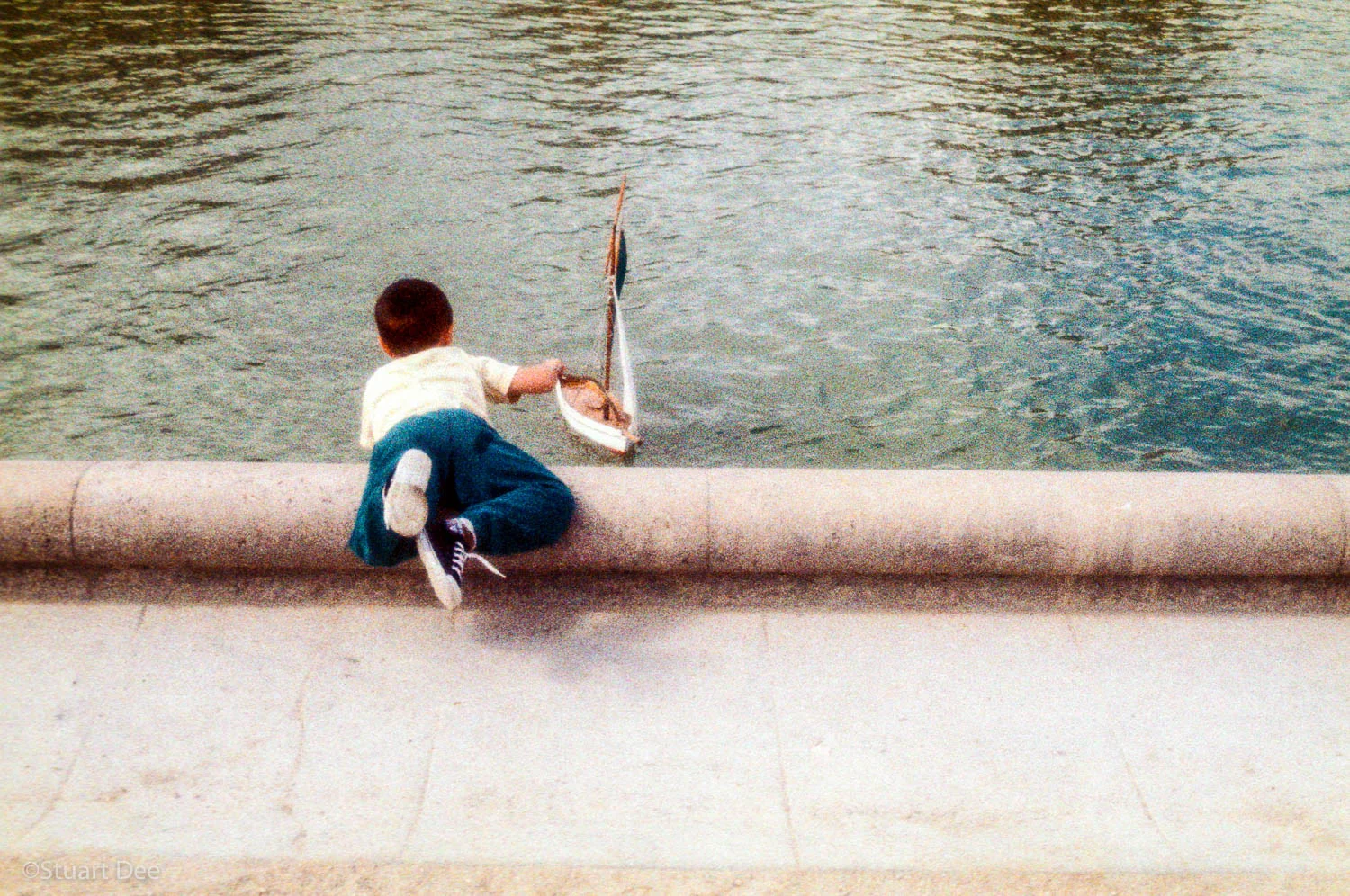 Boy with saliboat, Jardin du Luxembourg, Paris, France