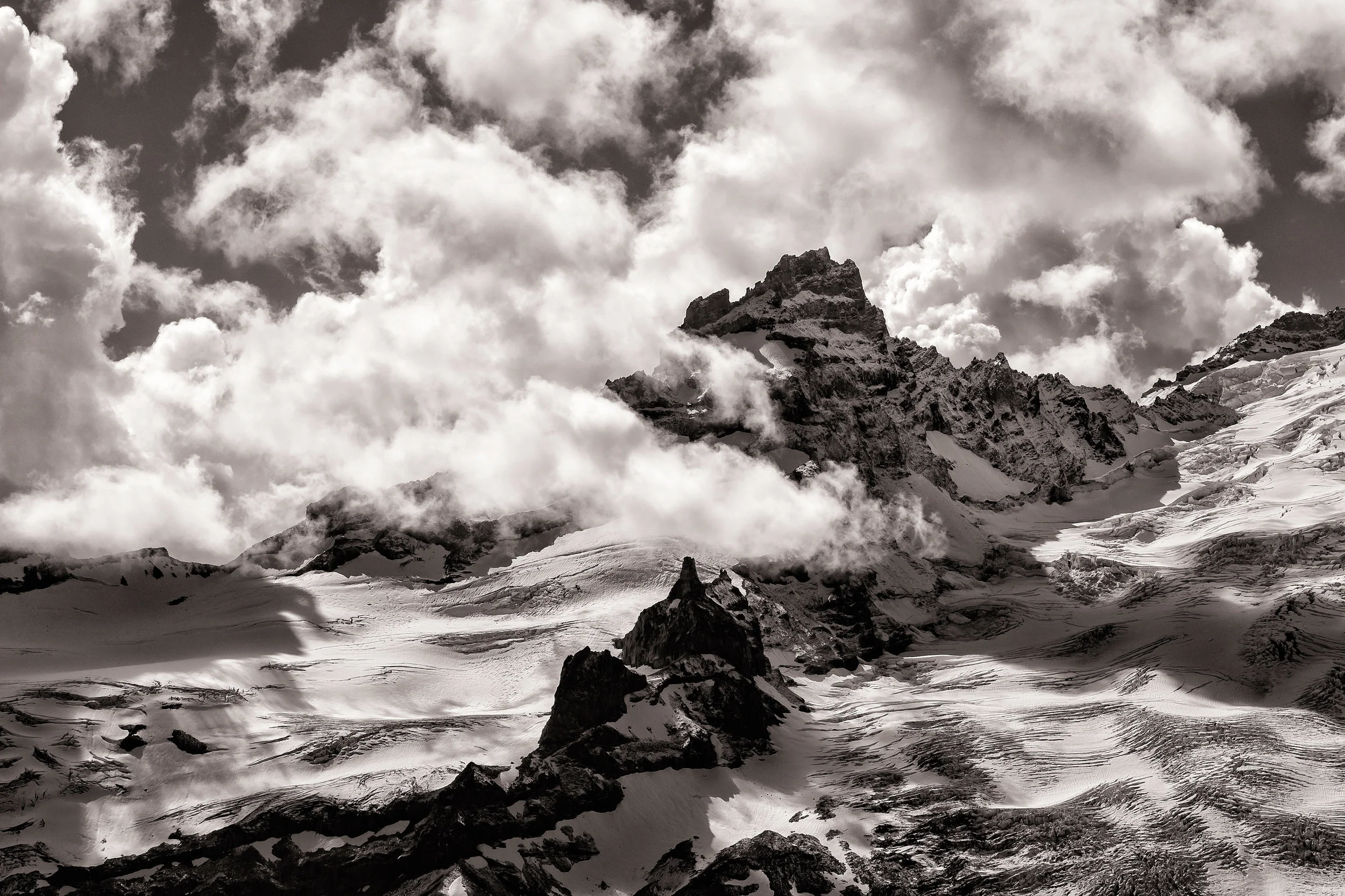 Landscape: Clouds hover around Little Tahoma in early autmn, Mt. Rainier National Park, Washington