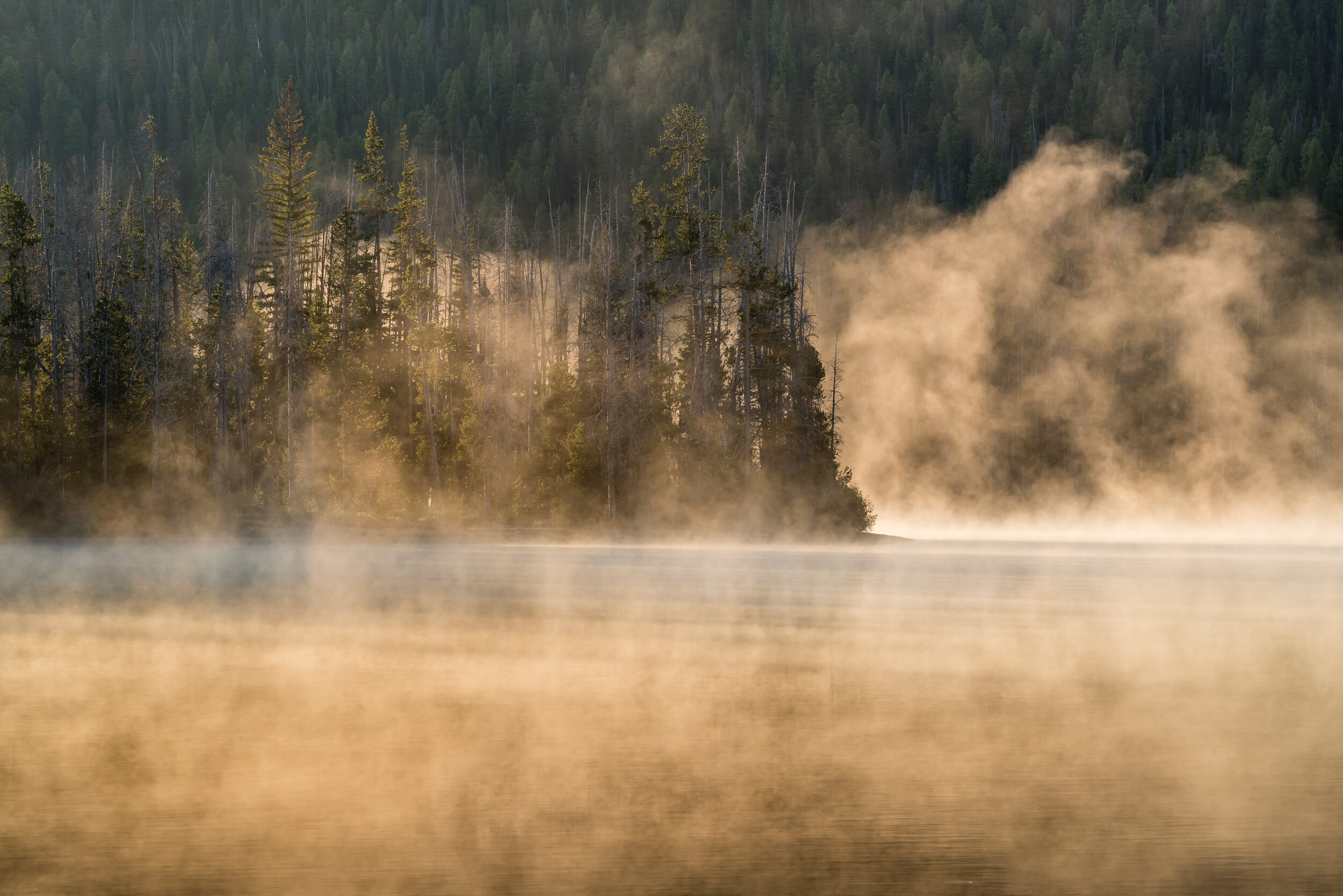 Fog rolling along Stanley Lake at sunrise in summer, Sawtooth Mountains,  Idaho — Stephen Matera Photographer