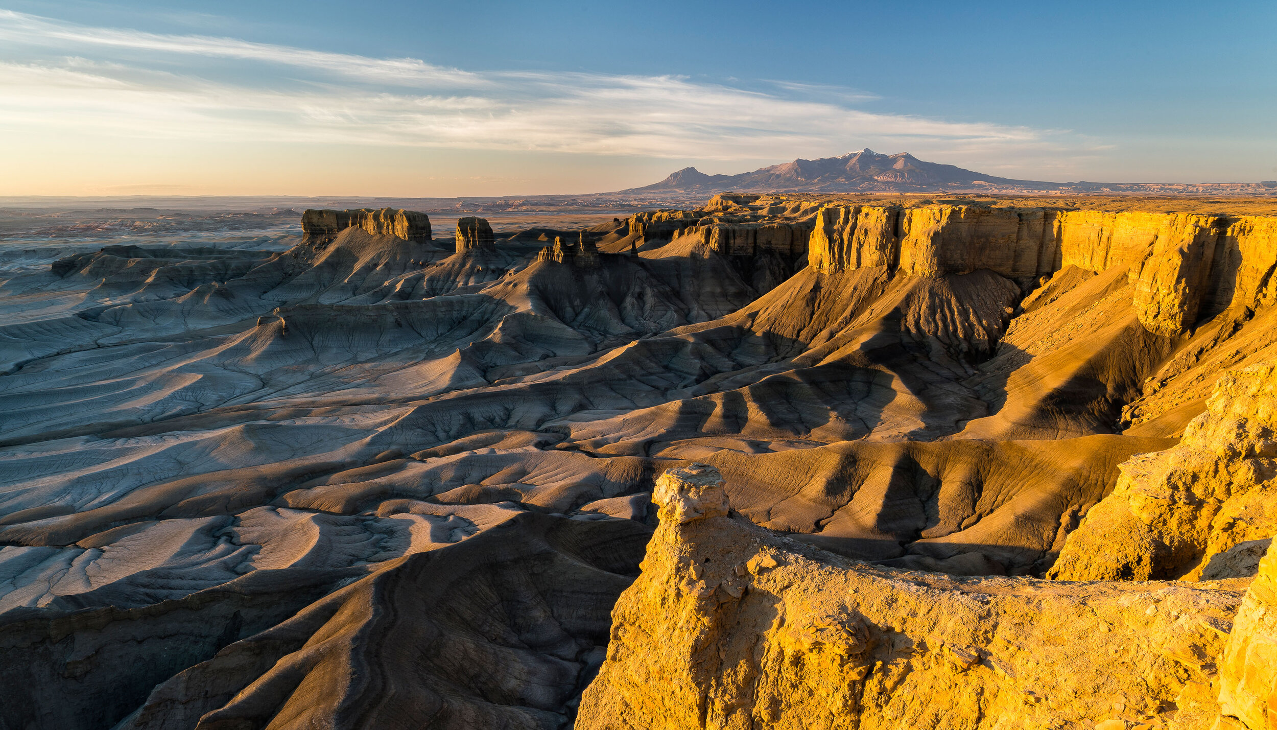  Landscape: The Henry Mountains rise above the desert moonscape at sunrise near Hanksville, Utah 