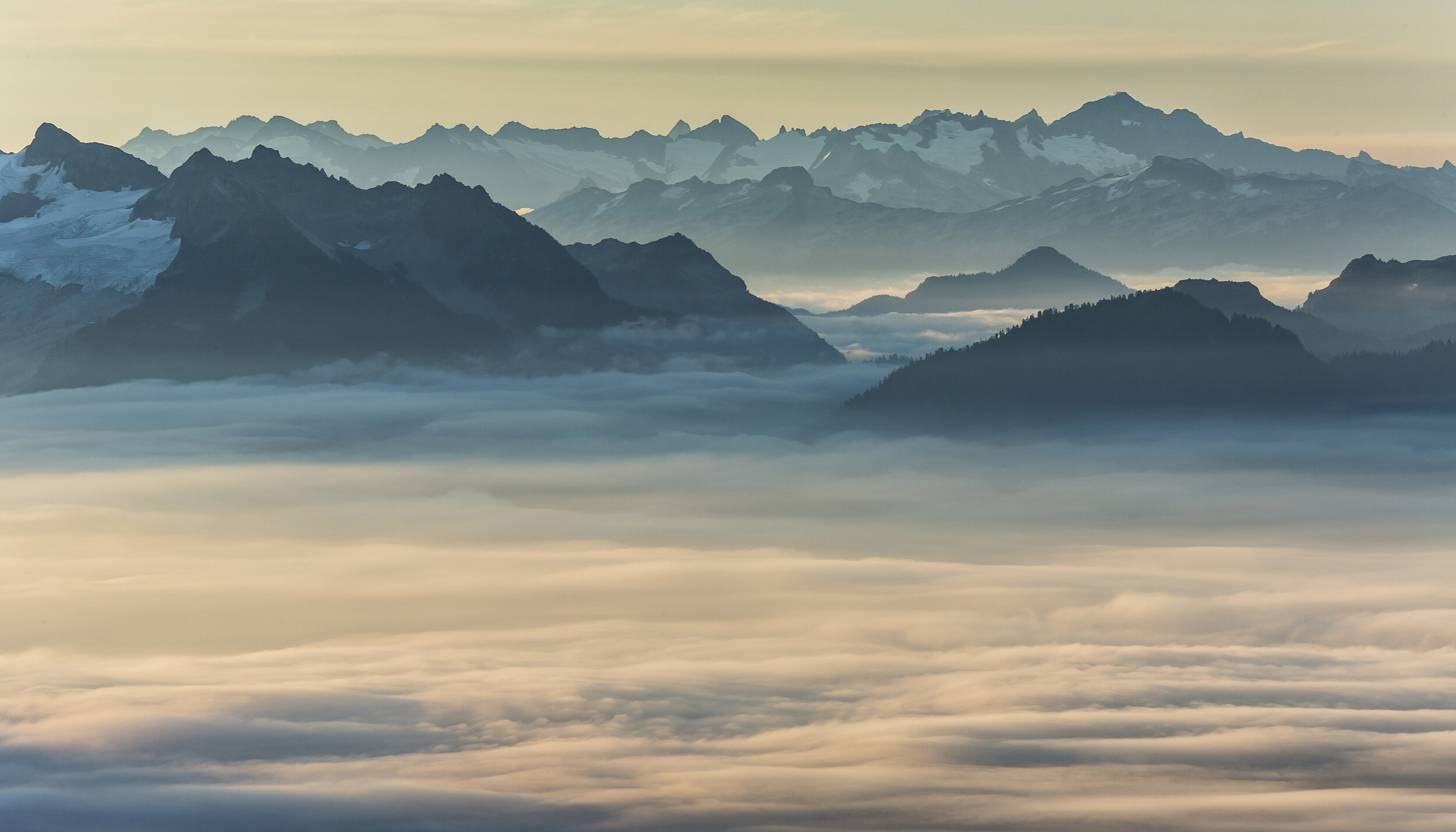  Landscape: Low clouds linger in the valley at sunrise, North Cascades National Park, Washington 