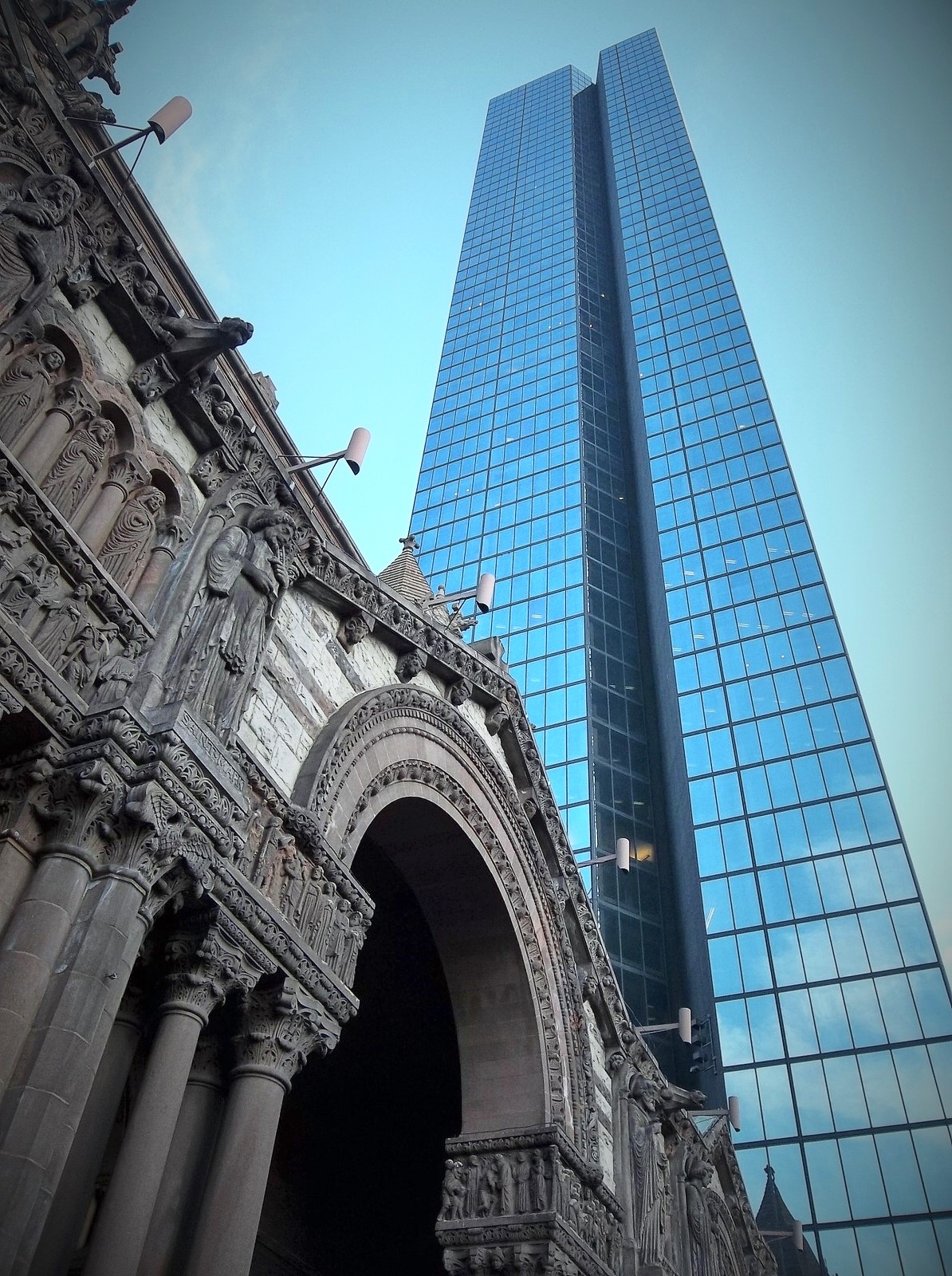 Trinity Church, Copley Place, Boston, against the contrast of the Hancock Tower