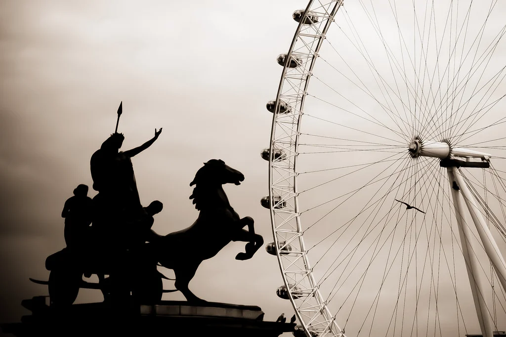 Queen Boadicea with the London Eye from across the Thames as backdrop. Photo credit.