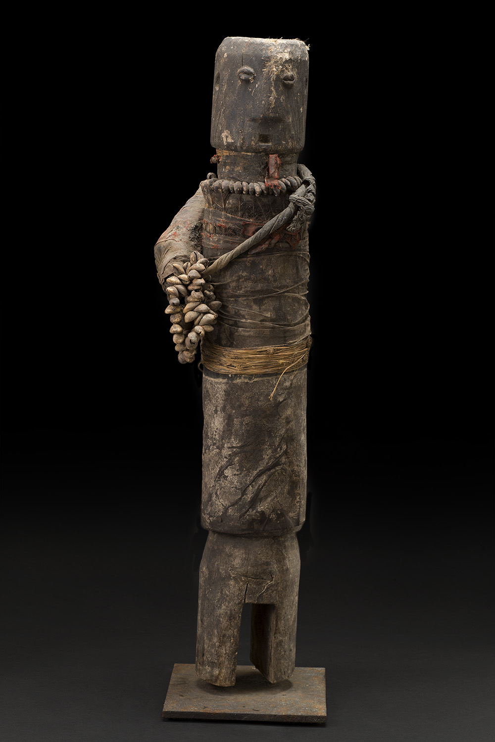   Africa    Bocio - Ewe/Adan People - Togo  , c. 1970-1980 Wood, fabric, feathers, pigment, shells, grass, and other natural materials 35.5 x 8.5 x 6.5 inches 90.2 x 21.6 x 16.5 cm Af 293 