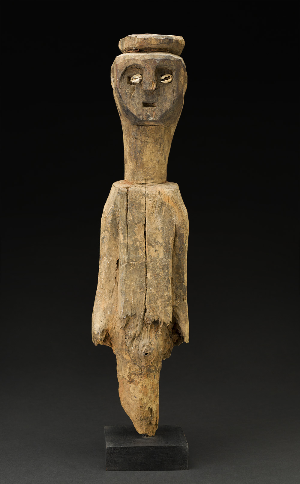   Africa    Bocio - Ewe People - Togo  , Mid. 20th C. Wood, shells, natural materials 19 x 5 x 3 inches 48.3 x 12.7 x 7.6 cm Af 330 