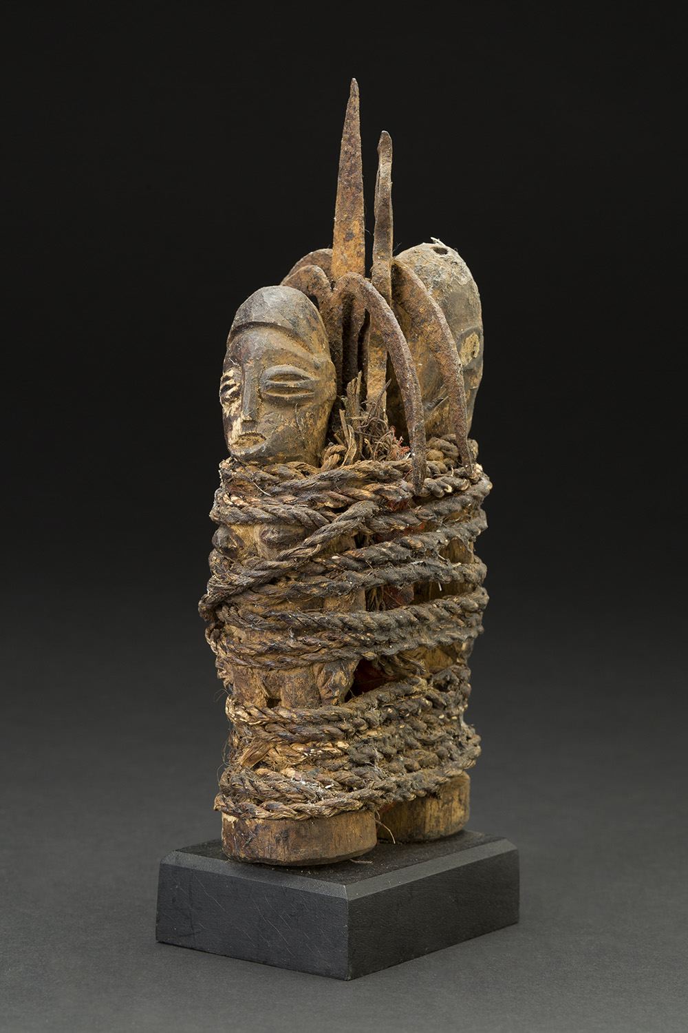   Africa    Vodun Sculpture - Adja People - Benin  , Mid. 20th C. Wood, metal, natural fibers 9 x 3.5 x 3.5 inches 22.9 x 8.9 x 8.9 cm Af 308 