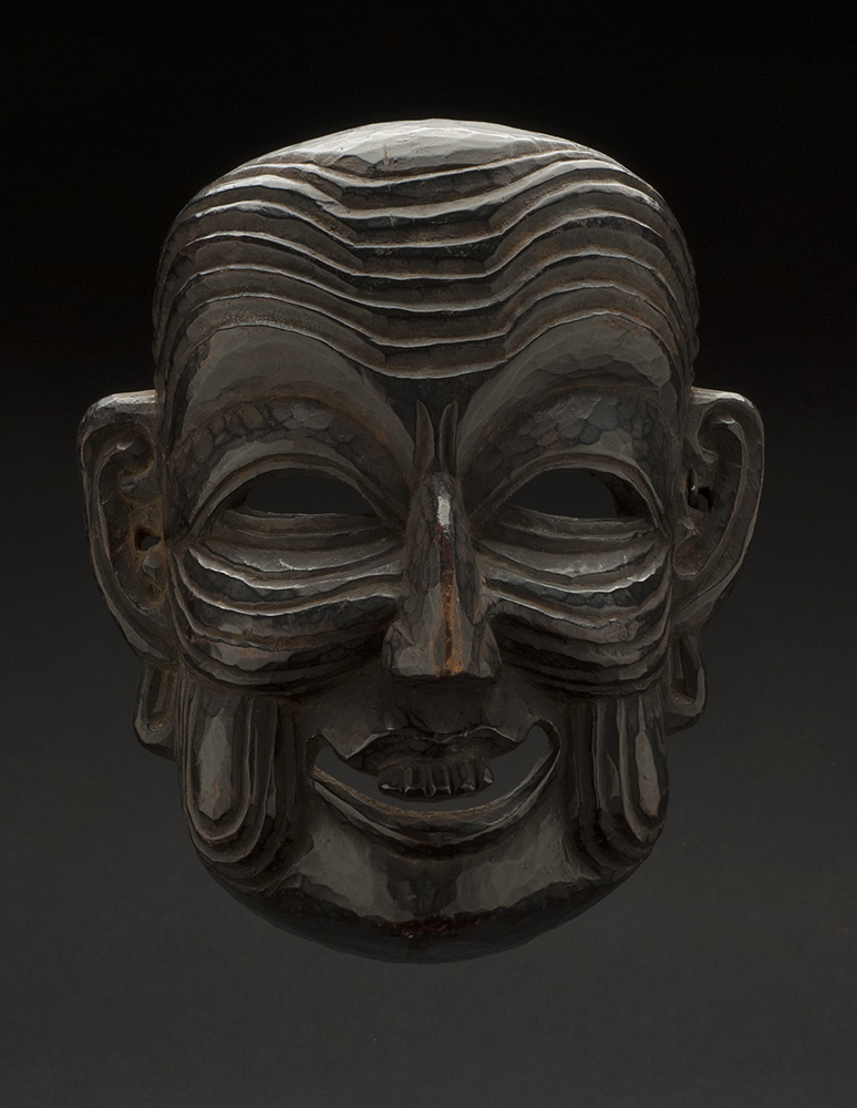   Masks    Arunachal Pradesh - India/Bhutan - Monpa-Apa Mask  , 19th C. Stained wood 10 x 8 x 5 inches 25.4 x 20.3 x 12.7 cm M 69s 