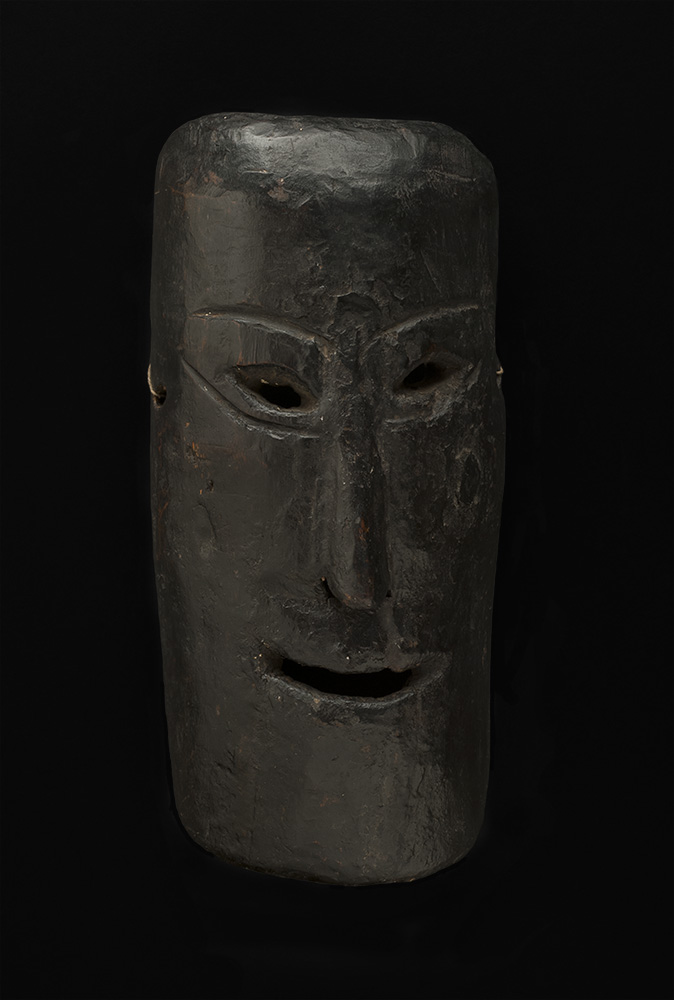   Masks    Nepal - West Nepal  , Early 20th C. Wood with black paint 12 x 6 x 3.5 inches 30.5 x 15.2 x 8.9 cm M 107s 